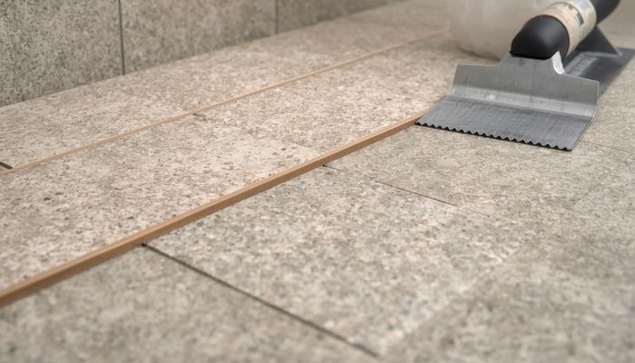 VCT vinyl composition tile flooring installed in a commercial or residential space with checkerboard pattern